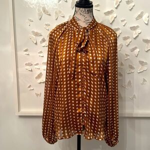 Long sleeve bow tie blouse .